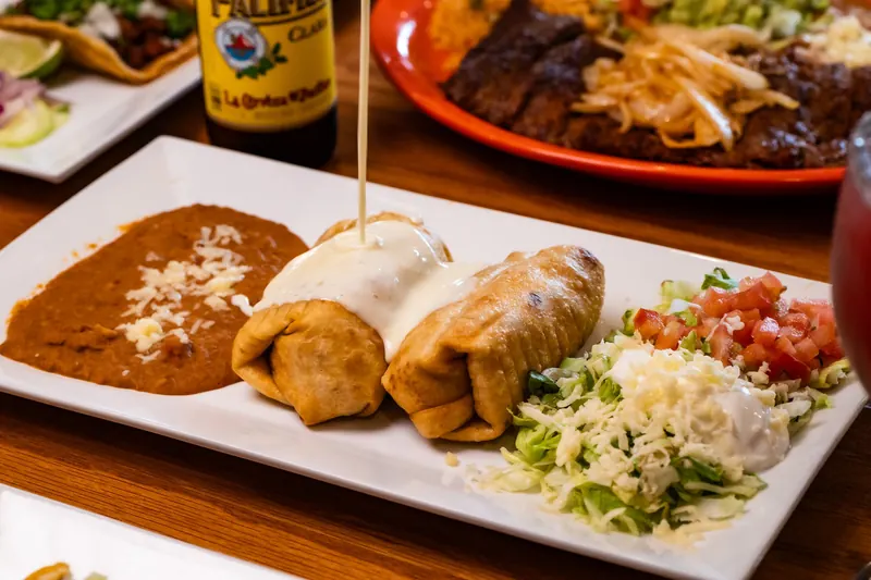 Chimichangas with beans and salad