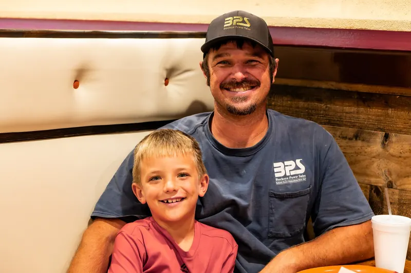 Dad and son at the table